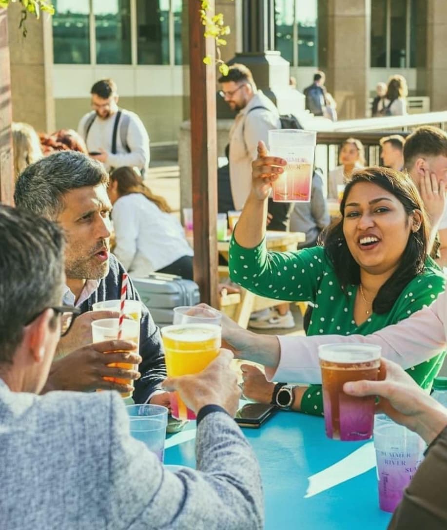 Festival goers with eco cups